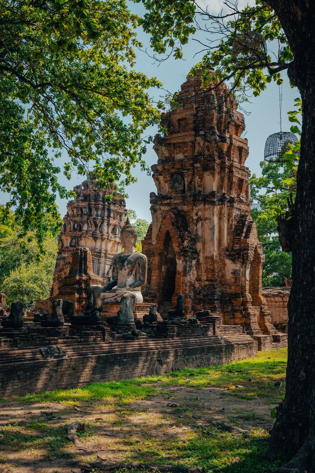 Broken brick walls and fallen masonry at Ayutthaya.