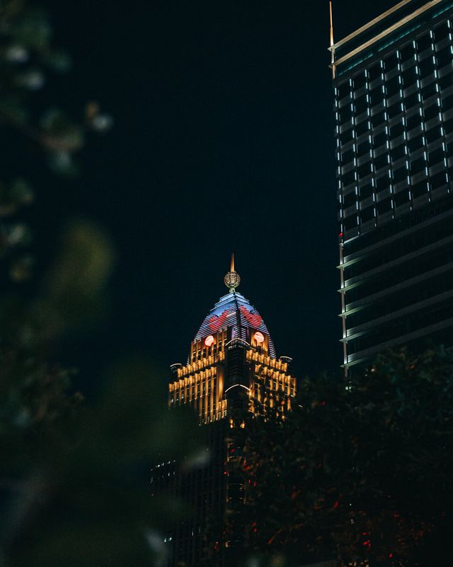 A building lit at night in Chiang Mai.