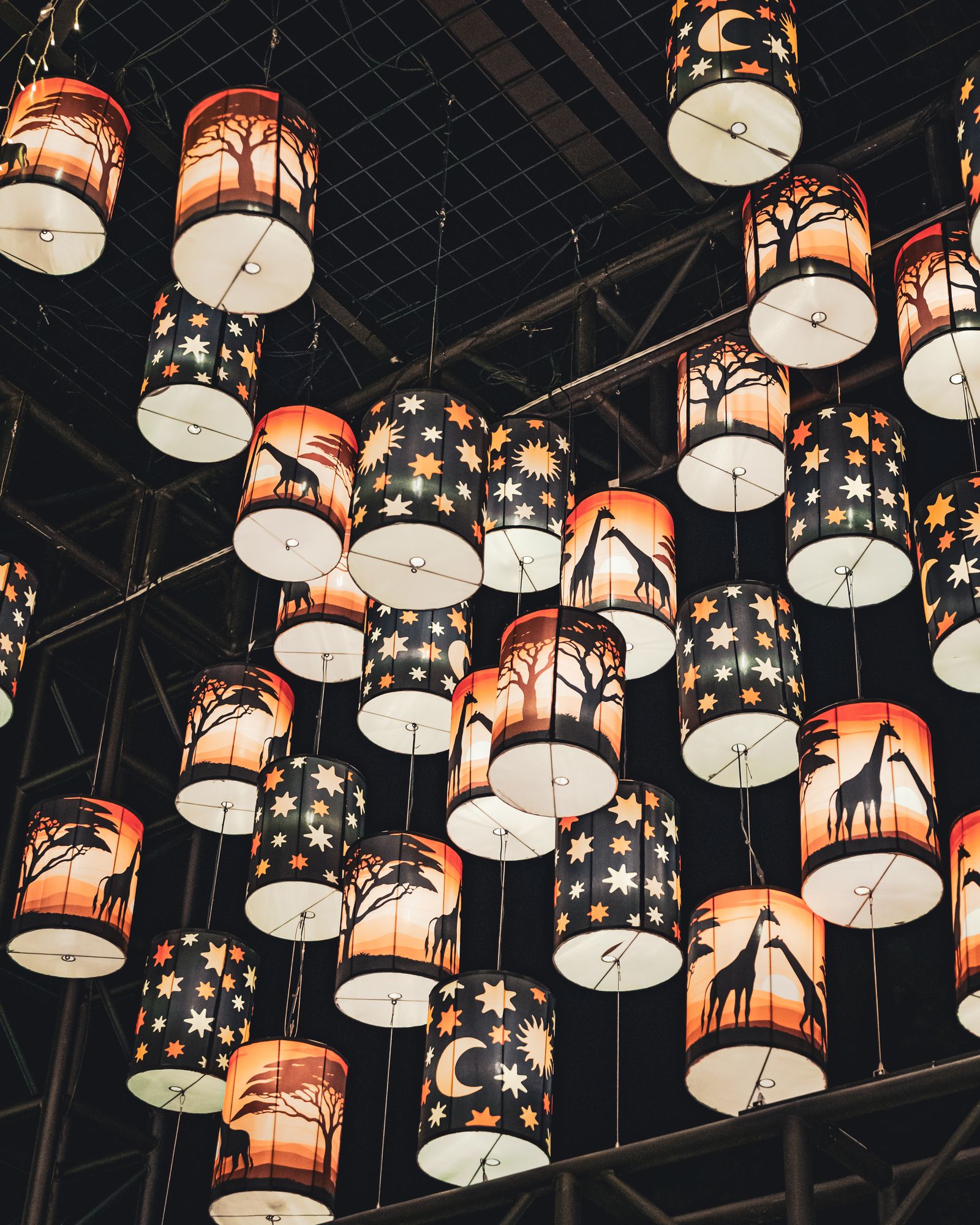 White and red lanterns shaped like flowers.