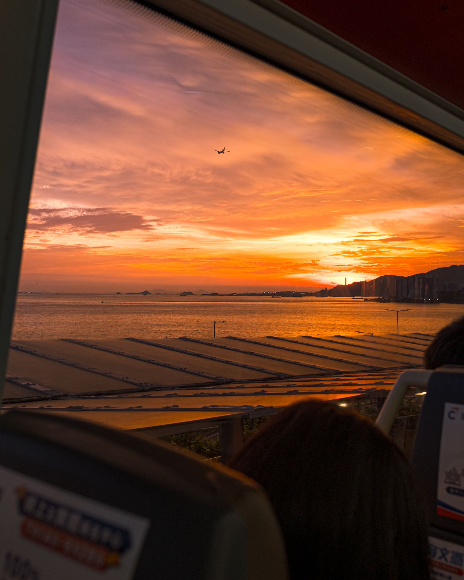 Sunset seen from a train window in Taipei.
